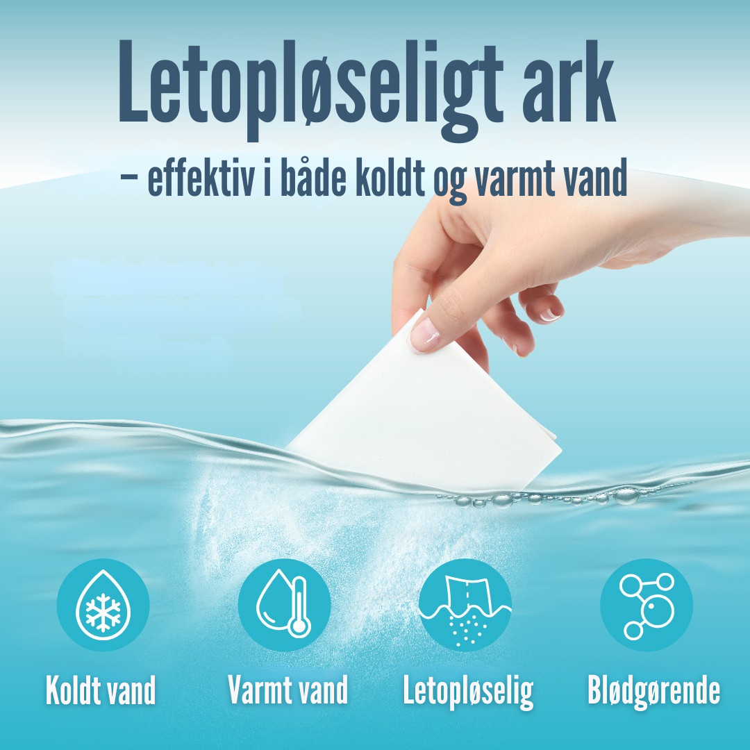 Ark placeret i tørretumbler blandt tekstiler