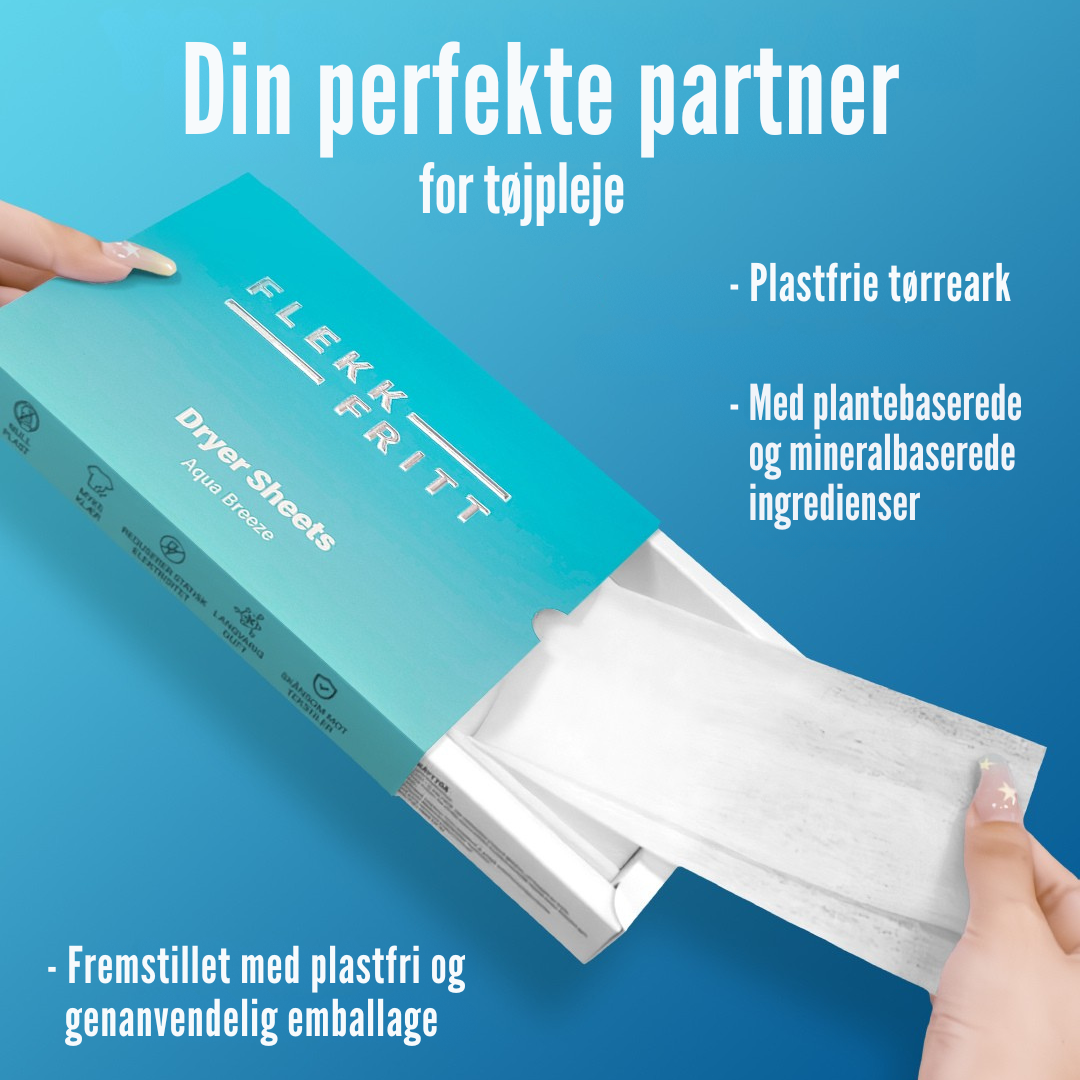 Ark lagt i tromlen blandt rent tøj