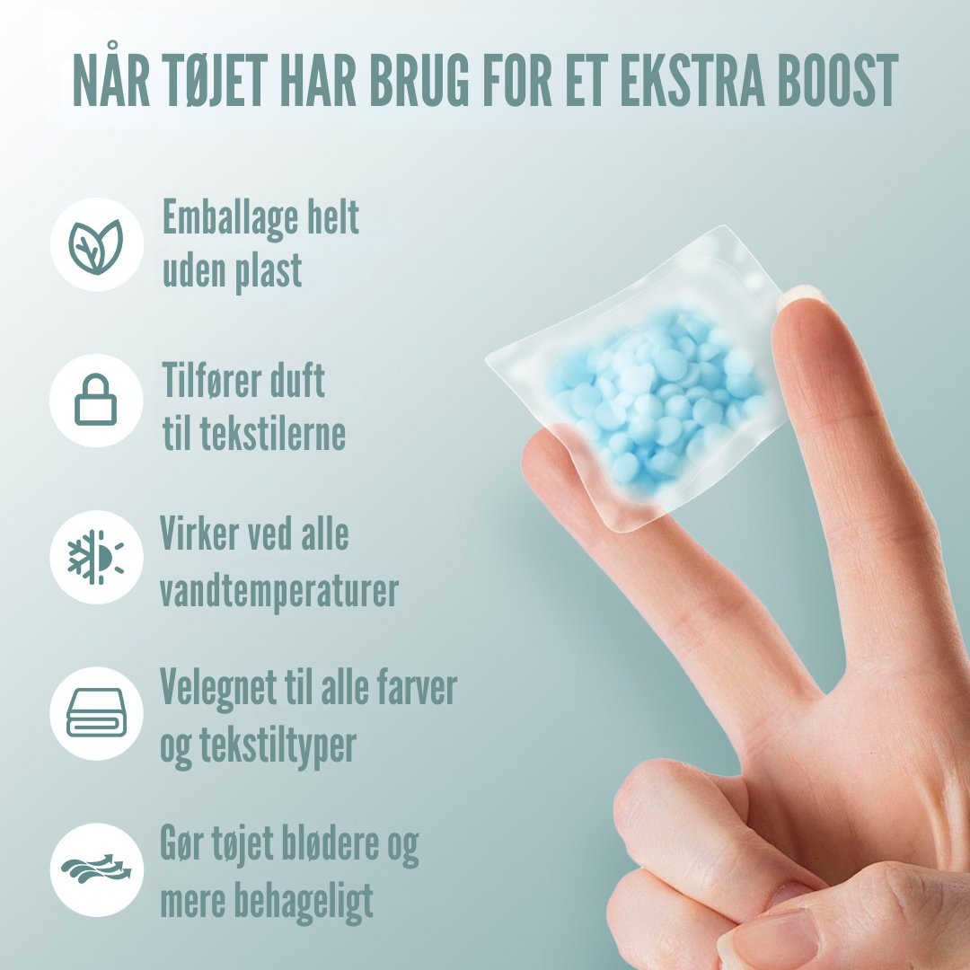 Transparent kapsel med hvide duftperler